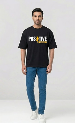 male model wearing black tshirt with blue jeans
